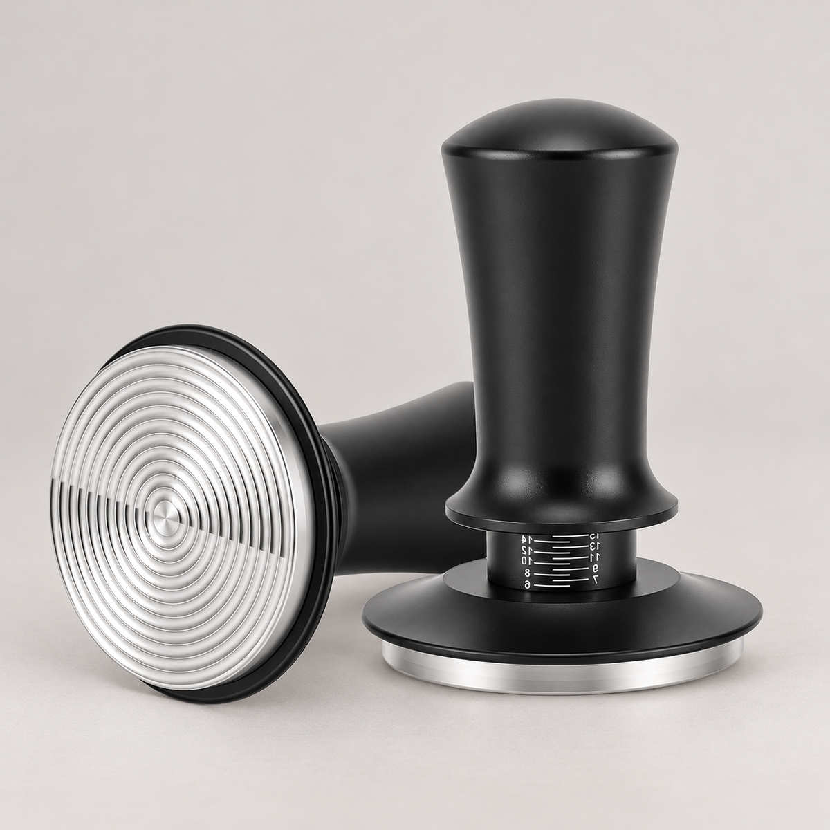 53mm spring-loaded espresso tamper — warm grey background
