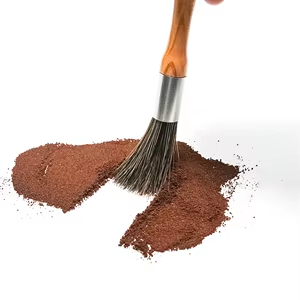 Coffee grinder dusting brush sweeping loose coffee grounds